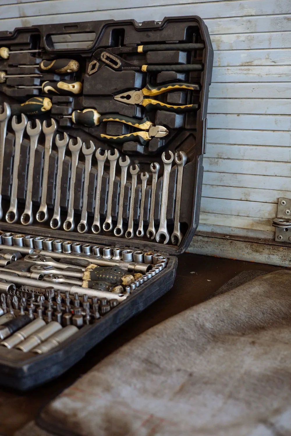 Tool case with wrenches and sockets